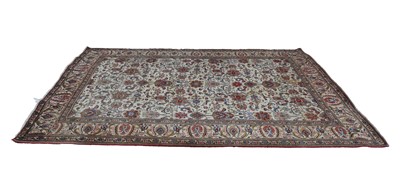 Lot 431 - A cream ground carpet