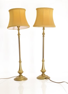 Lot 479 - A pair of brass table lamps