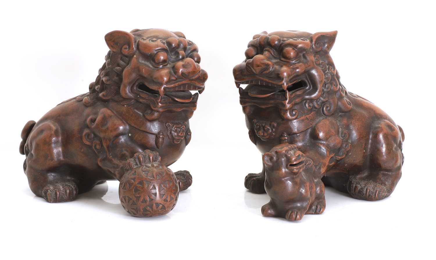 Lot 54 - A pair of Yixing style pottery dogs of Fo