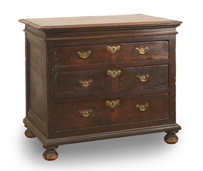 Lot 504 - A George I oak chest of three drawers