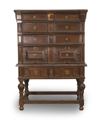 Lot 517 - A James II oak chest on stand