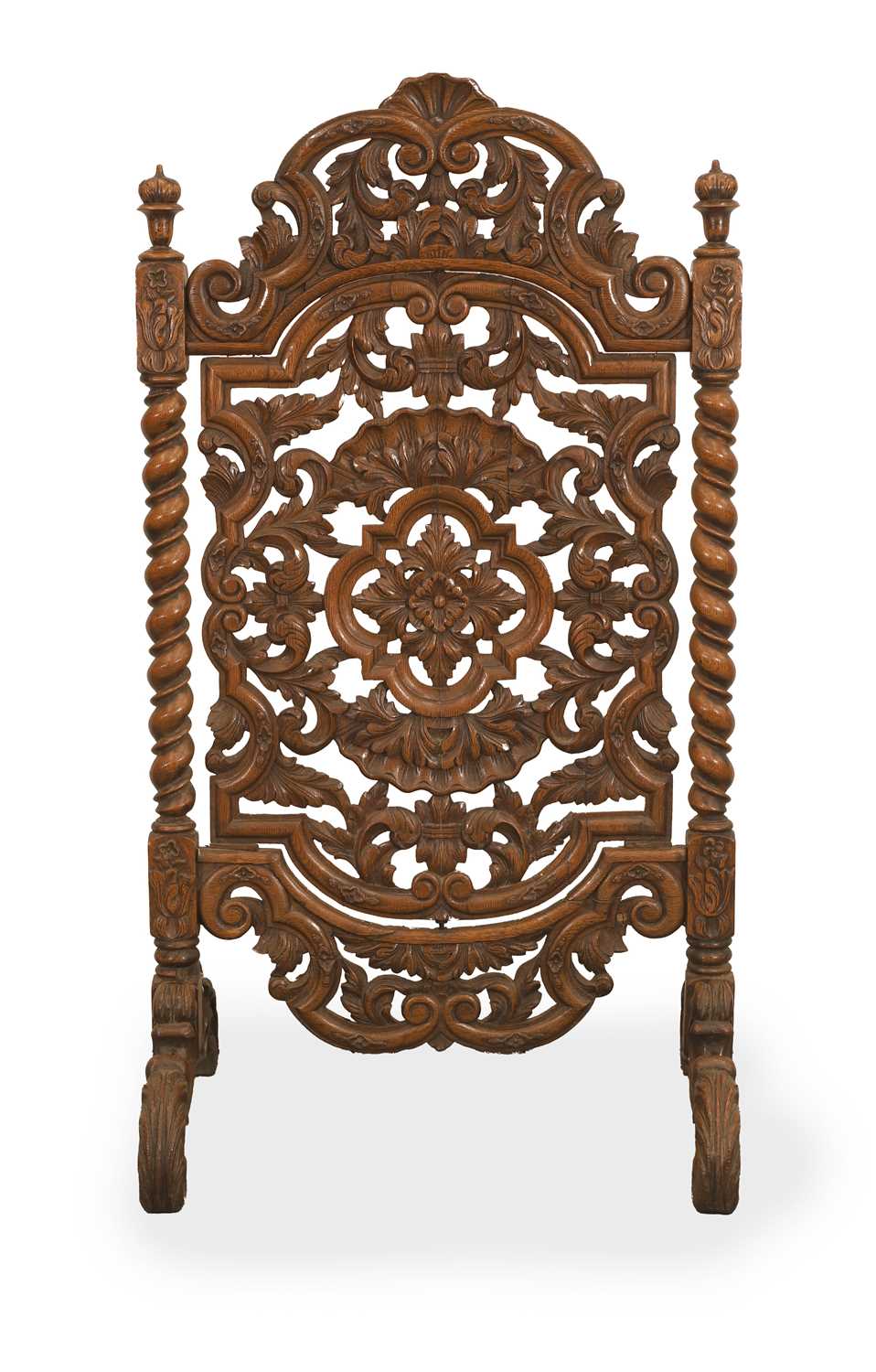 Lot 535 - A pierced walnut fire screen