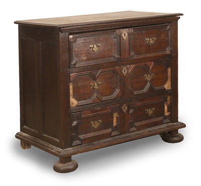 Lot 519 - An oak mitre front chest
