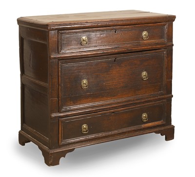 Lot 518 - An oak chest of three drawers