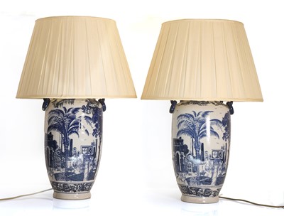 Lot 474 - A pair of large blue and white porcelain table lamps