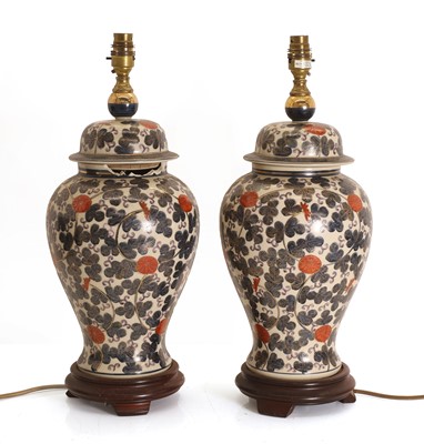 Lot 478 - A pair of imari style porcelain table lamps
