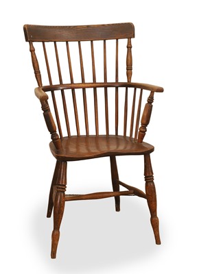 Lot 516 - A stick back Windsor chair