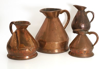 Lot 311 - A graduated set of copper haystack measures