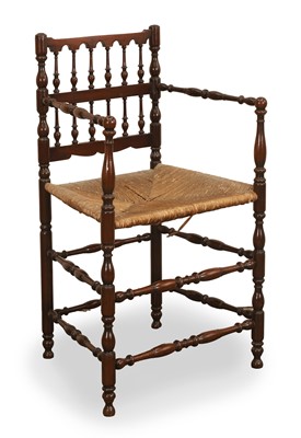 Lot 524 - A finely turned armchair