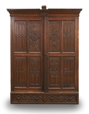 Lot 533 - A Gothic carved cupboard