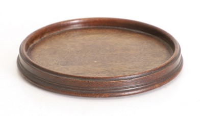 Lot 533A - A turned mahogany wine coaster