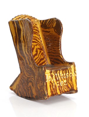 Lot 102 - A Yorkshire slipware rocking chair