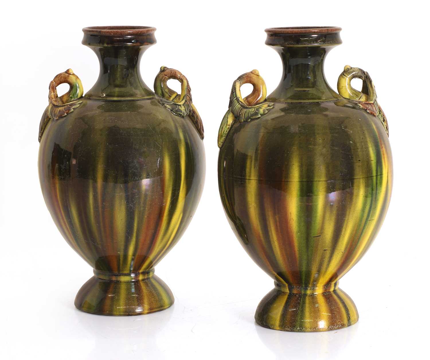 Lot 104 - A pair of pottery vases, possibly Burmantofts