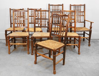 Lot 530 - A set of six plus two elm and ash spindle back chairs