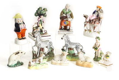 Lot 118 - A collection of Staffordshire pottery