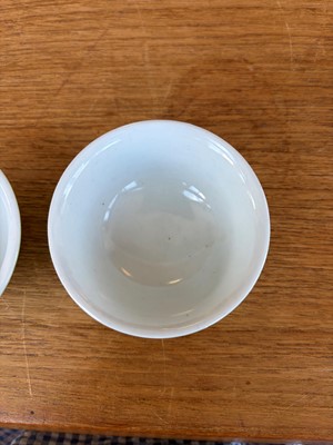 Lot 56 - A pair of Chinese sgraffito green-ground famille rose tea bowls