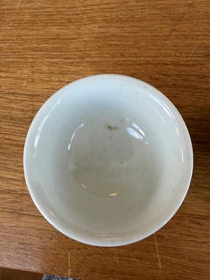 Lot 56 - A pair of Chinese sgraffito green-ground famille rose tea bowls