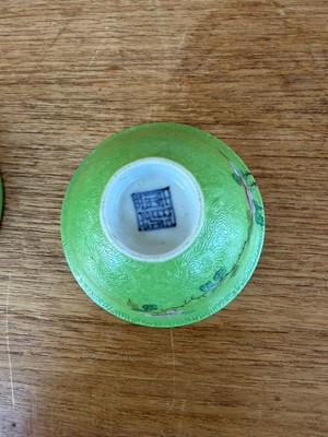 Lot 56 - A pair of Chinese sgraffito green-ground famille rose tea bowls