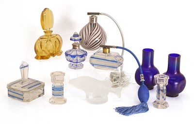 Lot 151 - An Art Deco glass facet cut four piece dressing table set