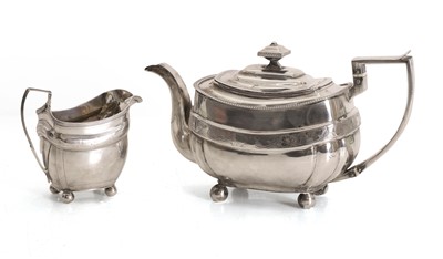 Lot 12 - A George III silver teapot