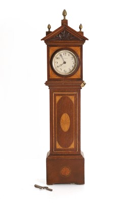 Lot 206 - An inlaid mahogany miniature longcase clock