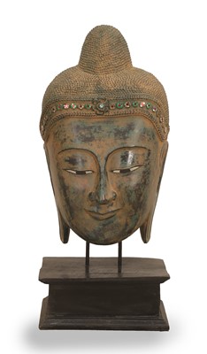 Lot 70 - A painted composite Buddha head
