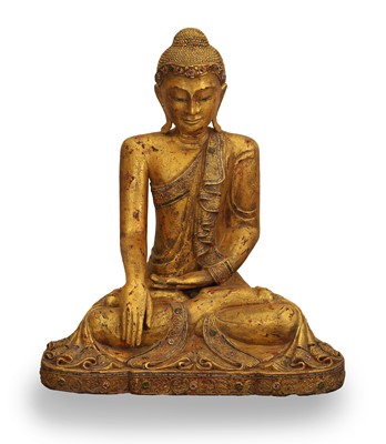Lot 71 - A gilt-composition Buddha
