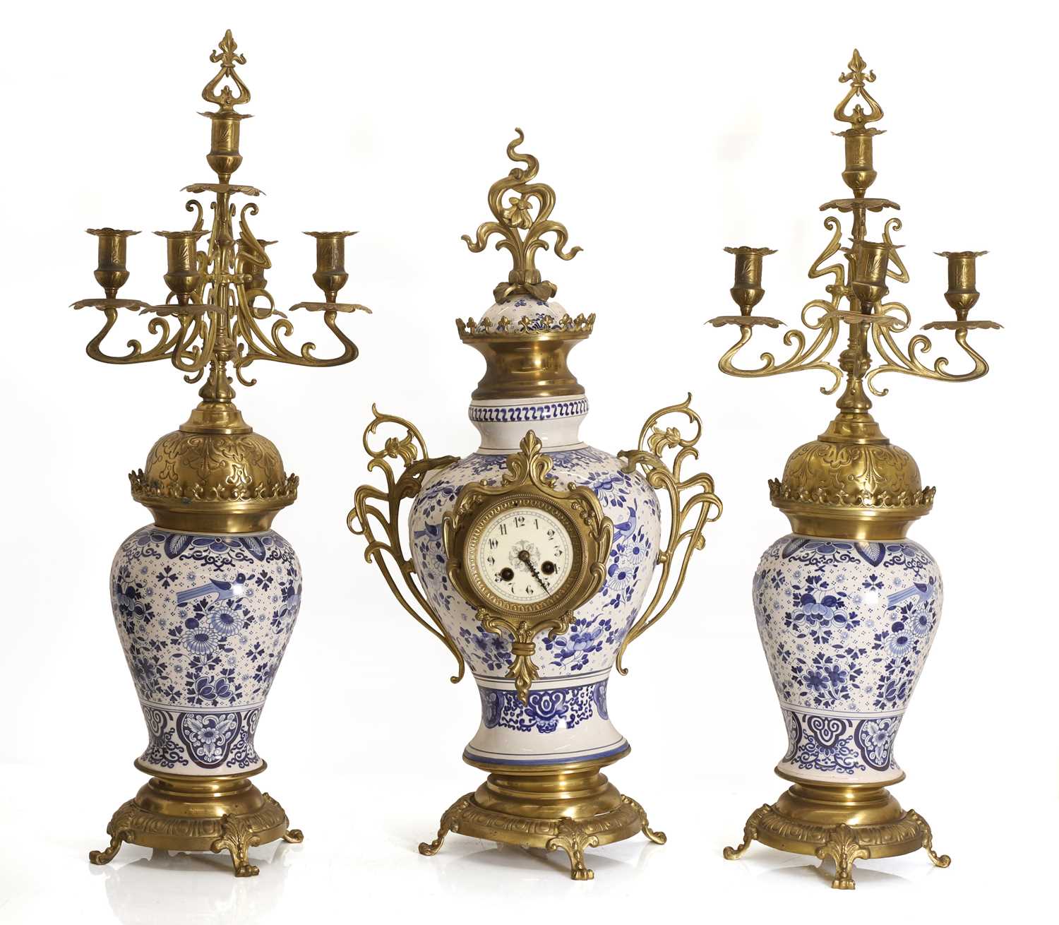 Lot 342 - A large Dutch Delft-style clock garniture