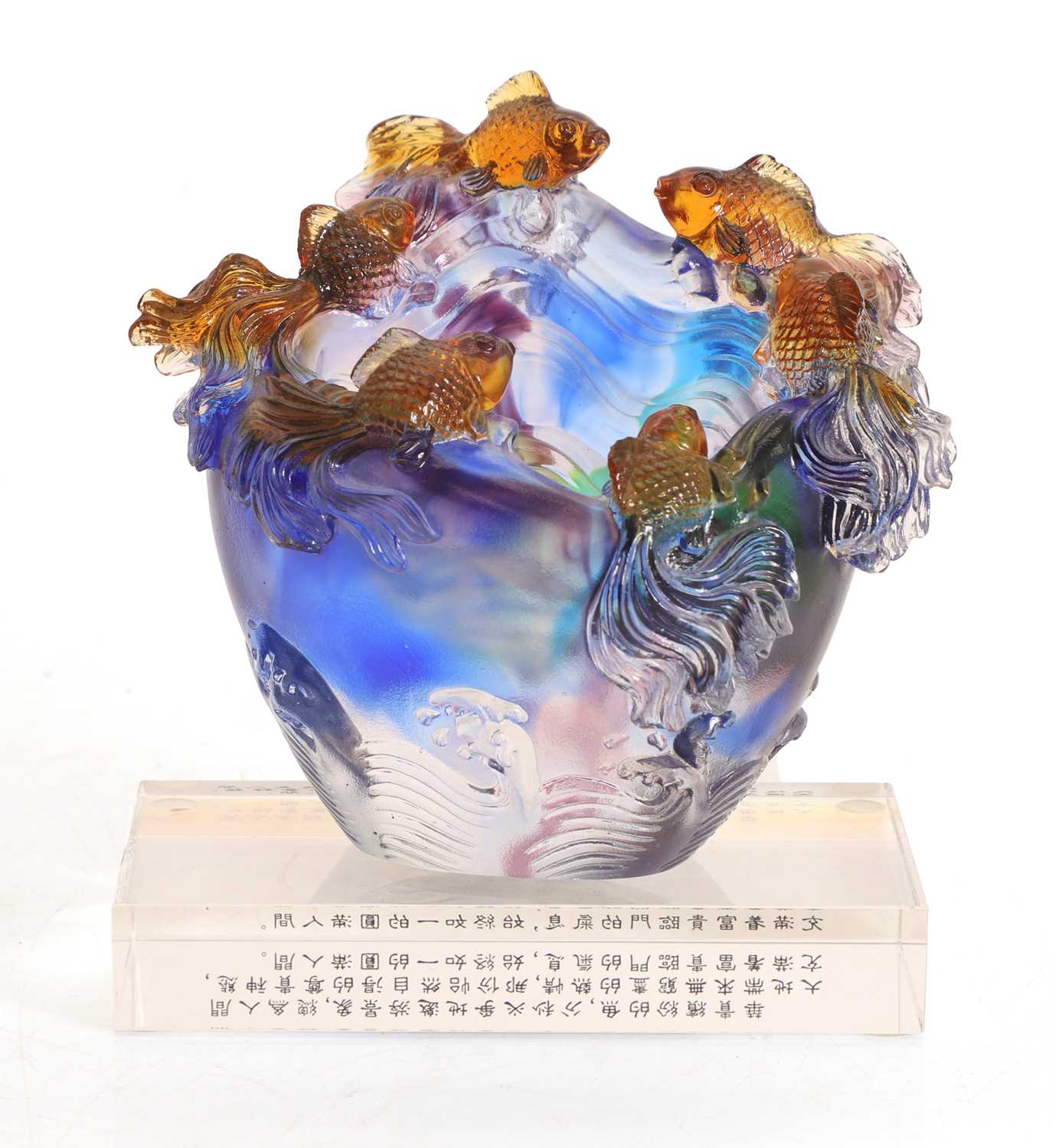 Lot 153 - A Chinese moulded glass trophy