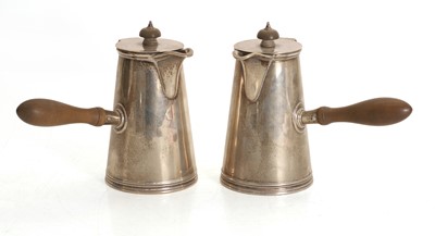 Lot 23 - A pair of silver coffee pots