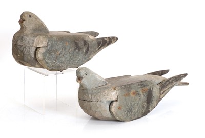 Lot 310 - A pair of primitive painted wooden decoy pigeons
