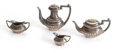 Lot 1 - A miniature silver four piece tea service