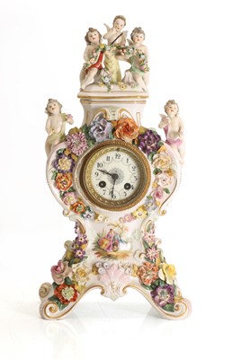 Lot 202 - A German porcelain mantle clock