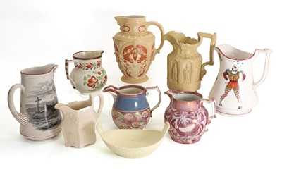 Lot 105 - A collection of pottery and stoneware jugs