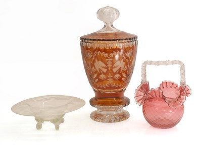 Lot 151 - A large cut glass and amber lidded jar