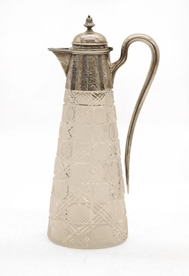 Lot 21 - A silver mounted cut glass claret jug