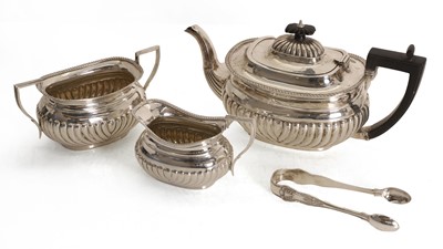 Lot 14 - A silver three piece tea set