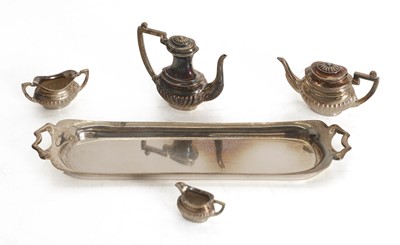 Lot 7 - A miniature silver four piece tea service on a tray
