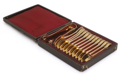 Lot 50A - A cased set of twelve spoons and a pair of tongs