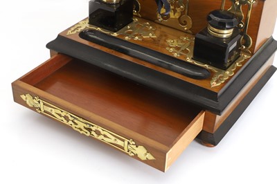 Lot 306 - A Victorian walnut brass-mounted and ebonised desk stand