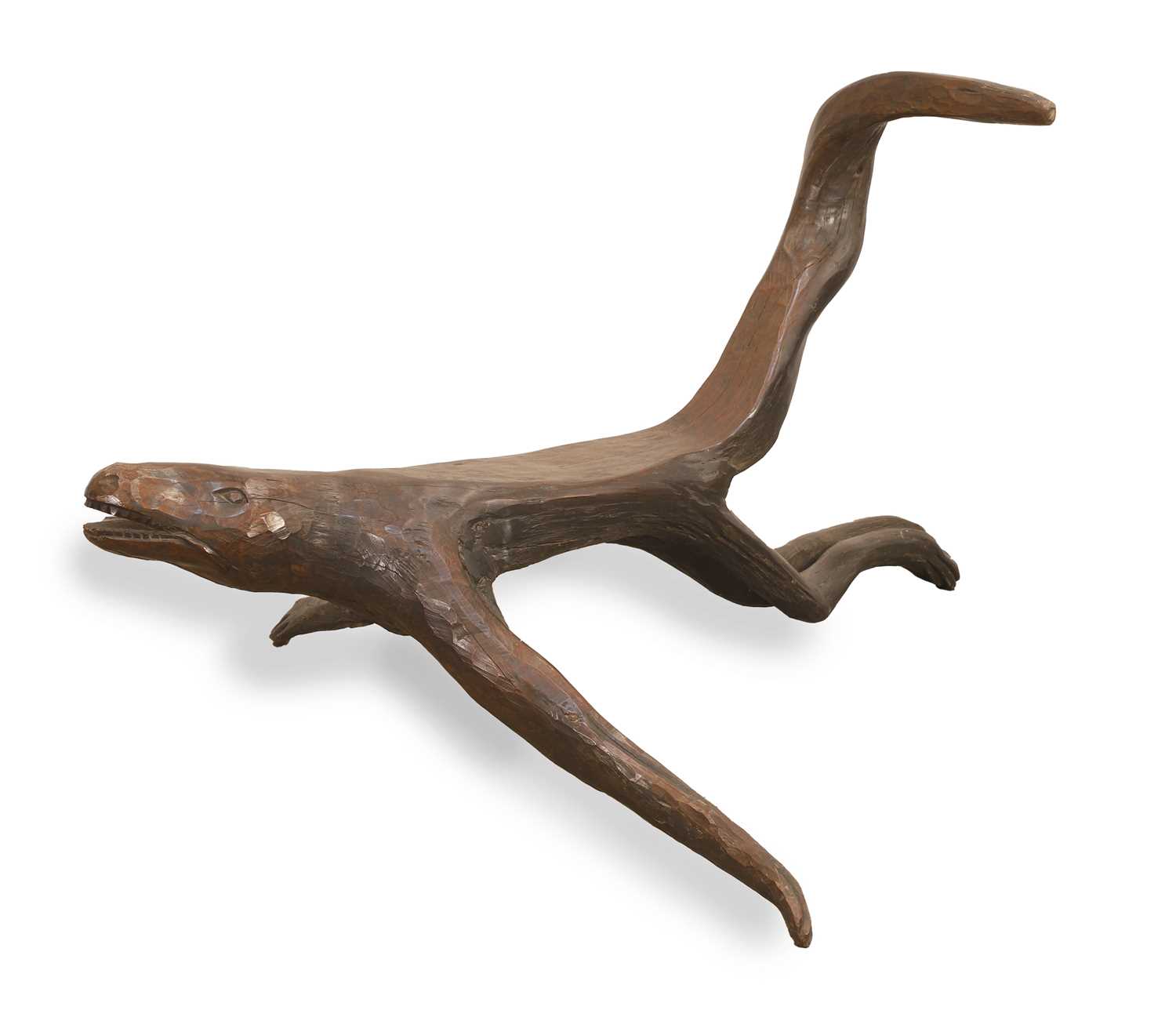 Lot 311 - An African carved dragon stool
