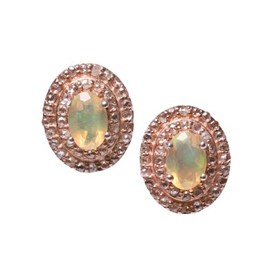 Lot 157 - A pair of silver gilt opal and diamond cluster stud earrings