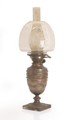 Lot 6 - A silver cased oil lamp