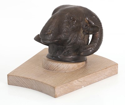 Lot 310 - A cast bronze ram’s head