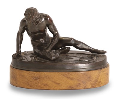 Lot 253 - A pressed bronzed tin figure