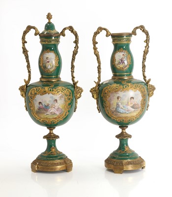 Lot 104 - A pair Sevres style vases