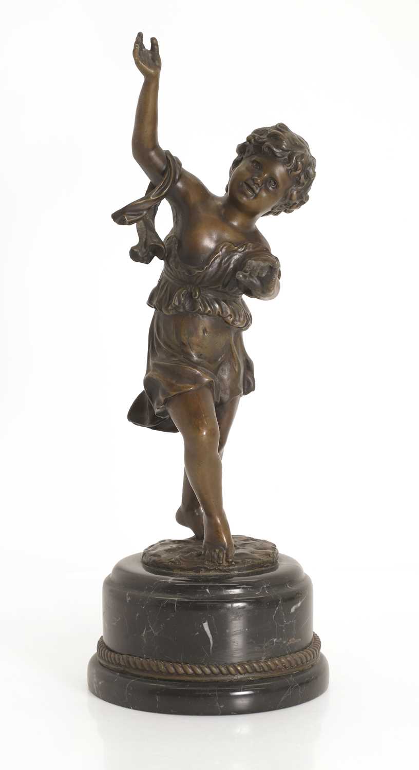 Lot 253 - A bronze figure of a putti