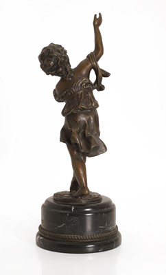 Lot 253 - A bronze figure of a putti