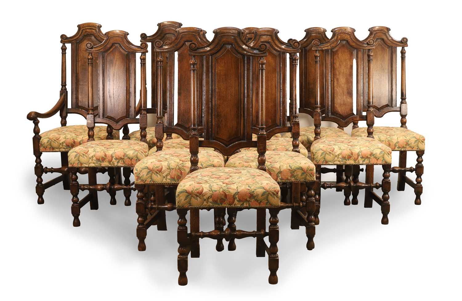 Lot 501 - A set of twelve oak dining chairs