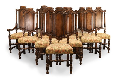 Lot 501 - A set of twelve oak dining chairs